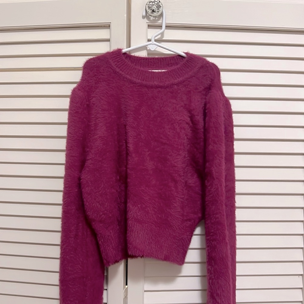 a hot pink sweater from a brand called lush!